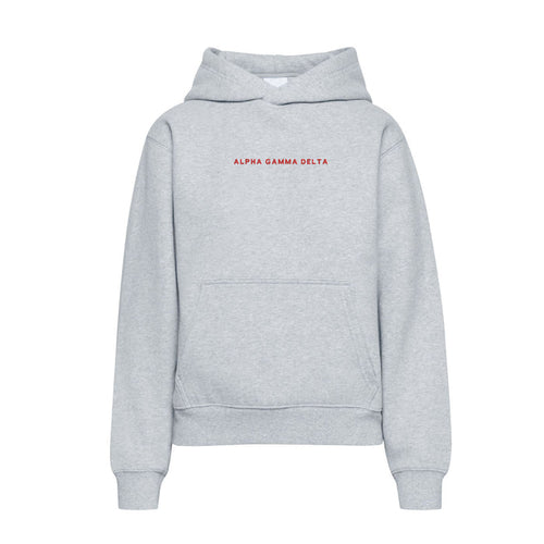 Light gray Alpha Gamma Delta hoodie with red embroidered wordmark